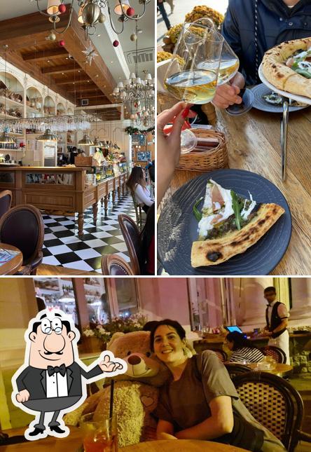 Посмотрите на внутренний интерьер "23 Cafe La Brasserie"