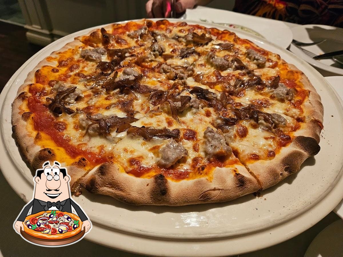 В "New’s Restaurant & Bar(Pizzazo)" вы можете попробовать  пиццу.