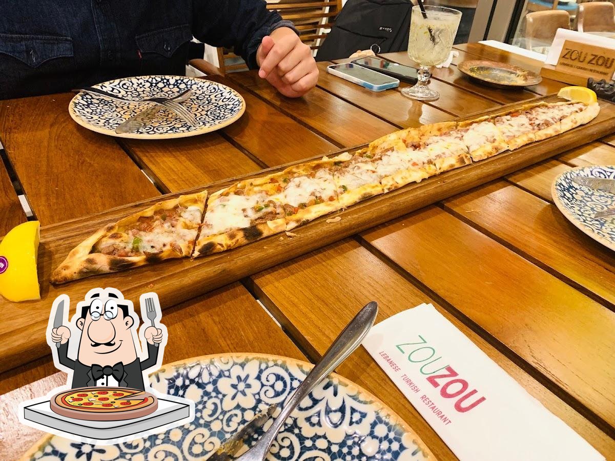 В "ZouZou Turkish & Lebanese Restaurant JBR DUBAI" вы можете попробовать  пиццу.