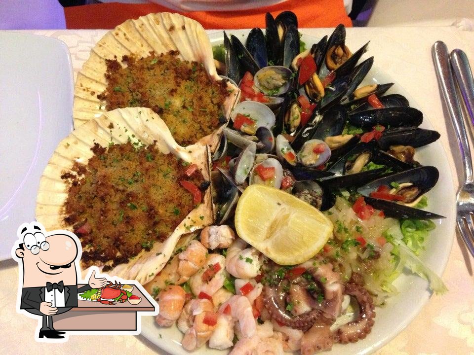  Побалуйте себя дарами моря в "Ristorante Venezia Felice".