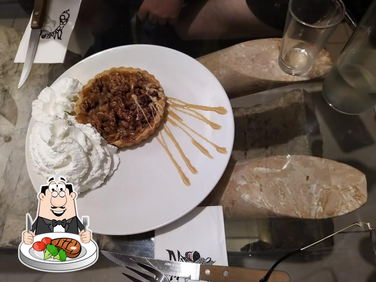 "Ресторан Зебра" предоставляет мясные блюда.