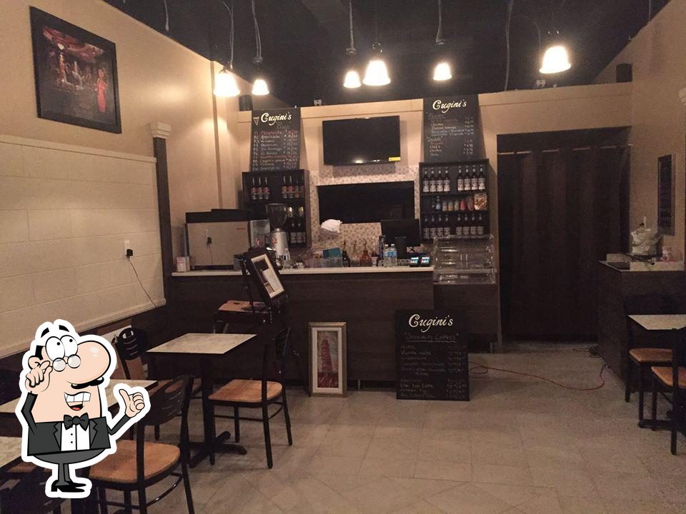 Интерьер "Cugini's pizza cafe".