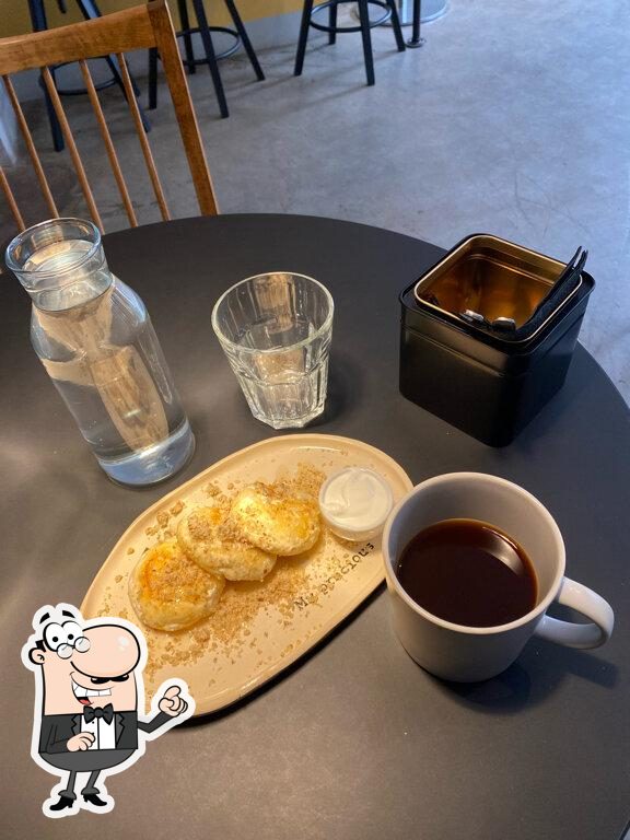 Посмотрите на внутренний интерьер "Stim Coffee".