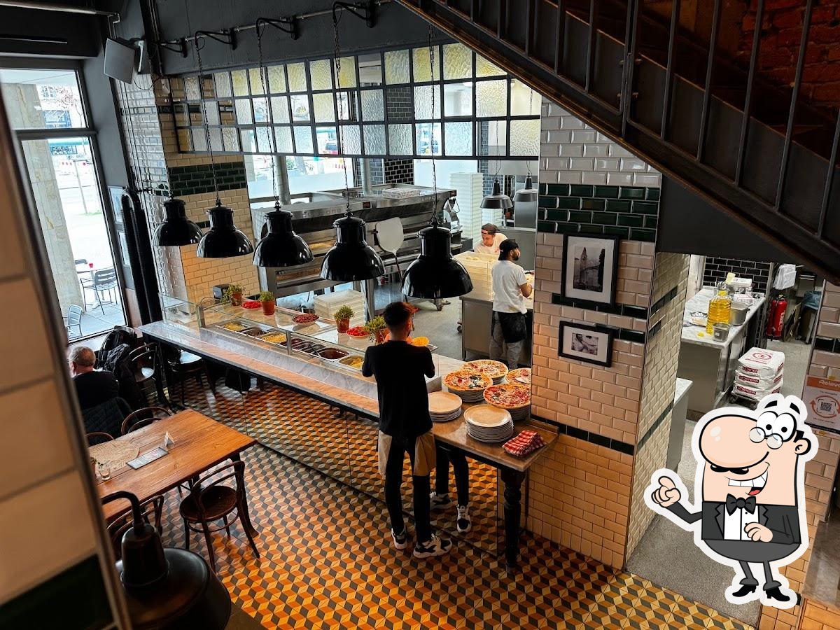 Забронируйте столик в "L'Osteria".