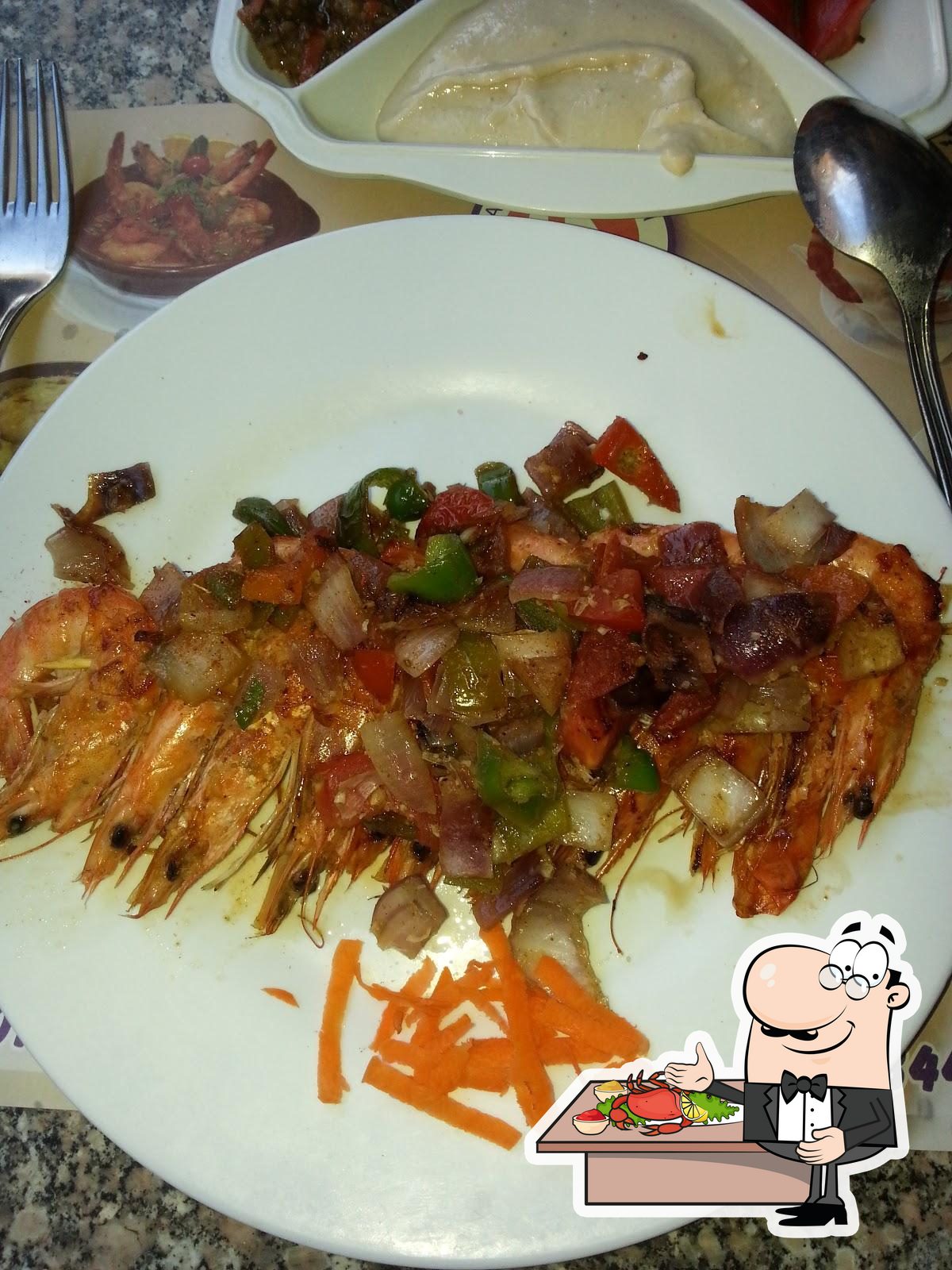 Насладитесь дарами моря в "Alsheraa Fish".