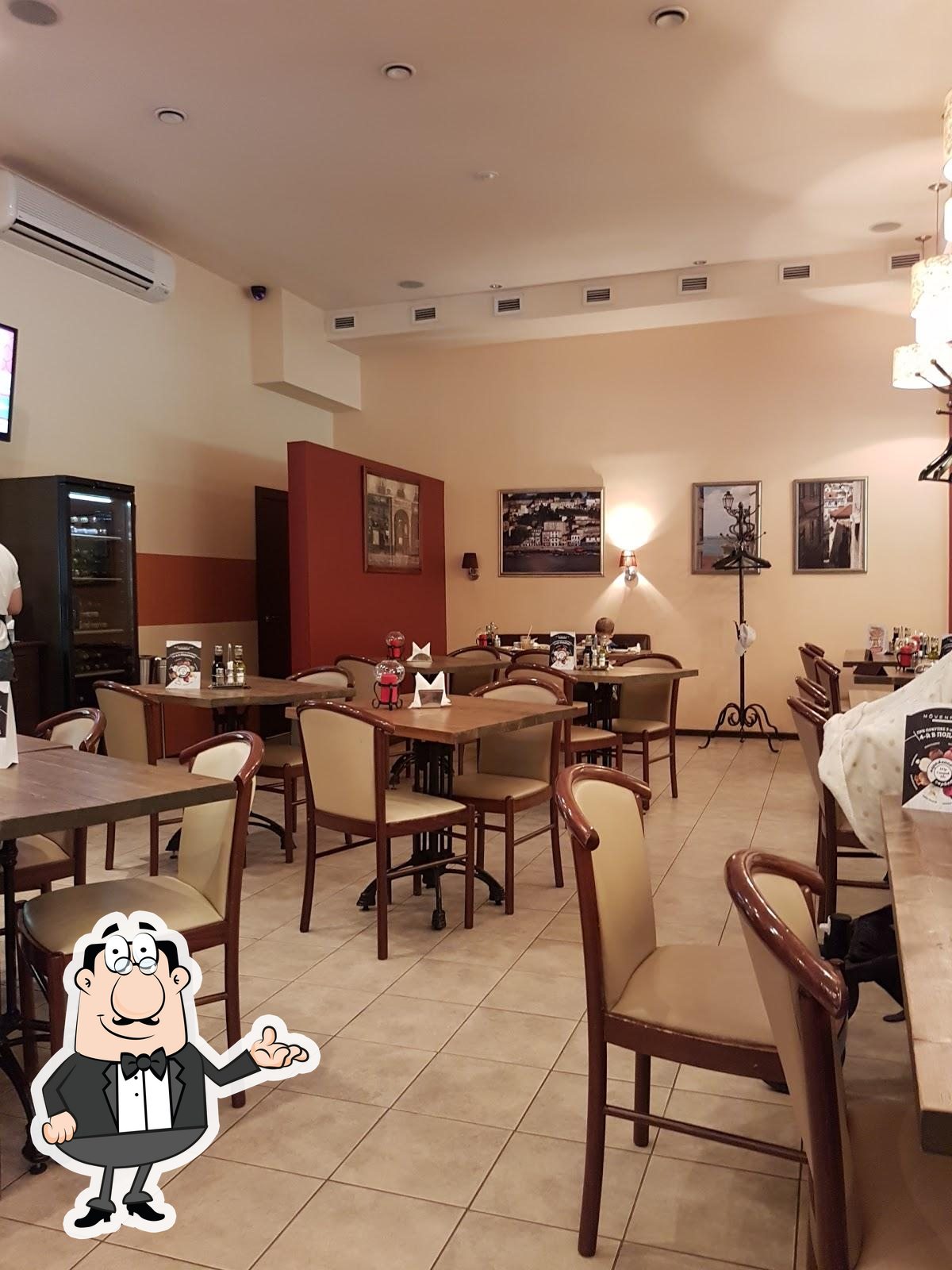 Посмотрите на внутренний интерьер "Виват Пицца".