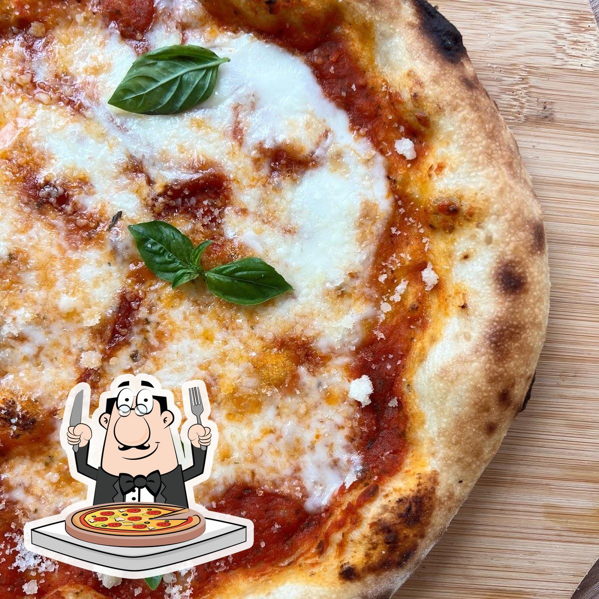 Попробуйте пиццу в "Ronin Pizza Lard Phrao 18".