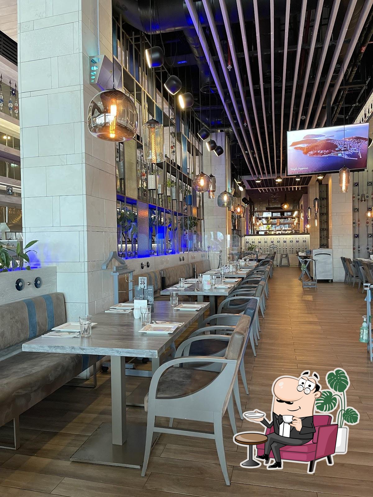 Посмотрите на внутренний интерьер "Turkish Village - Best Turkish Restaurant in Dubai".