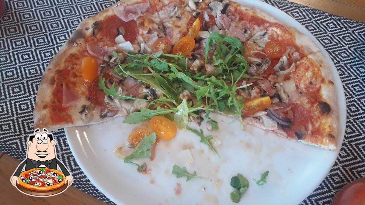  Отведайте пиццу в "Pizzeria Rucola".