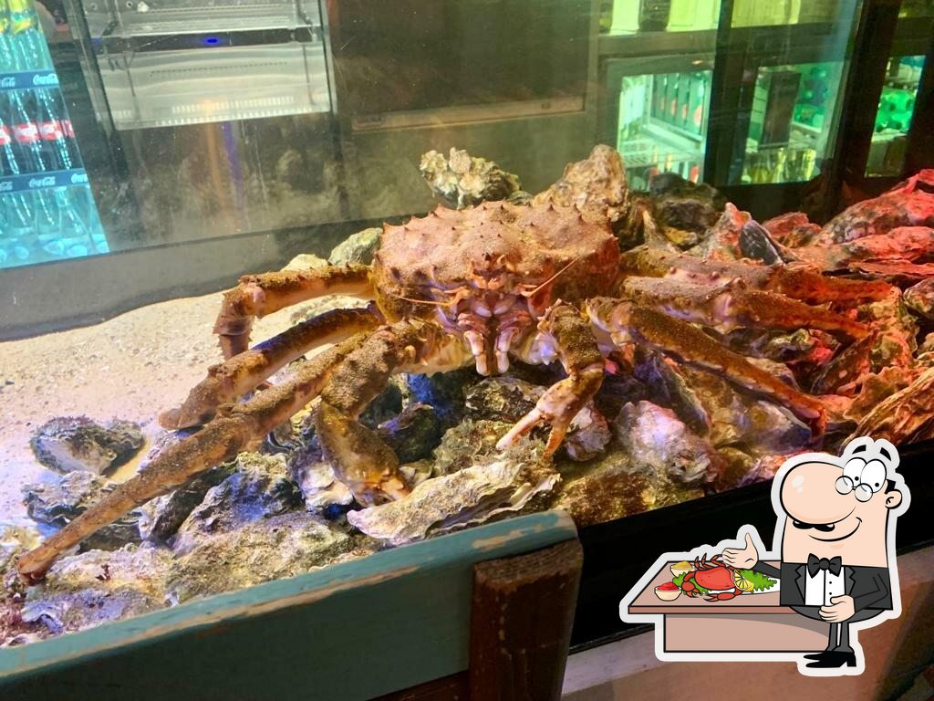  Побалуйте себя дарами моря в "Мандариновый краб".