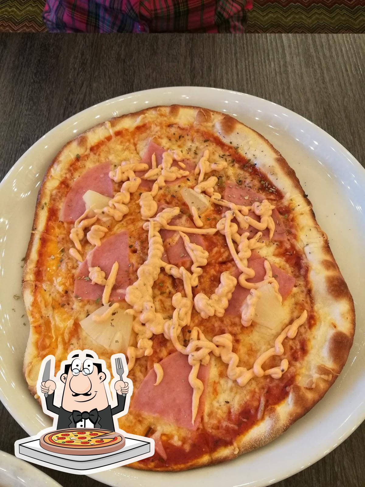  Отведайте пиццу в "Can Can Pizza".