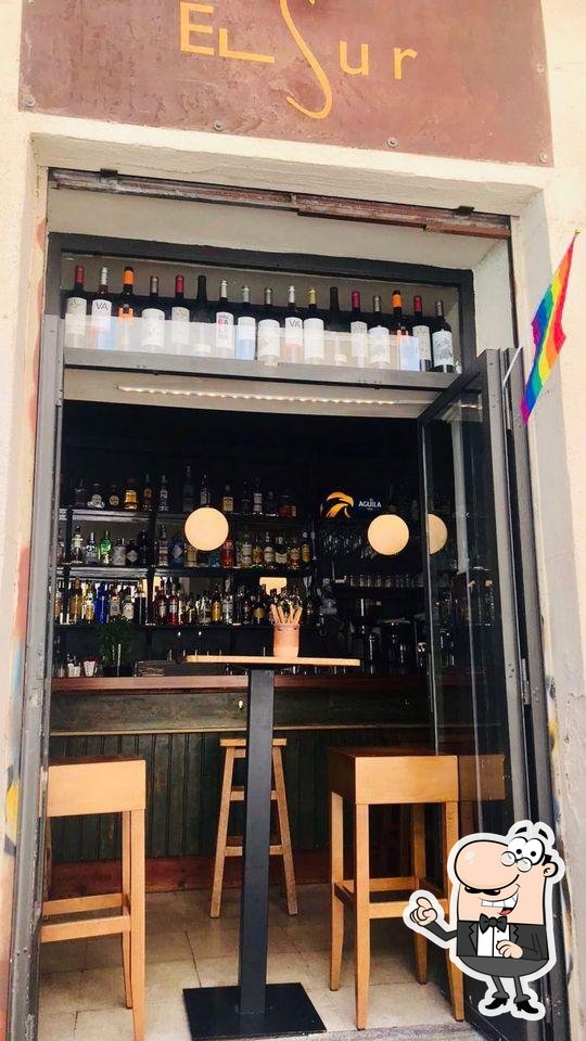 Забронируйте столик в "Taberna El Sur".