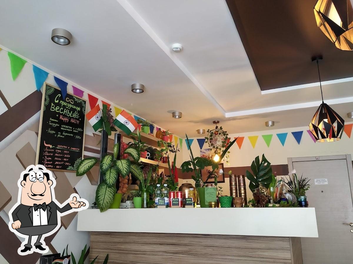 Забронируйте столик в "New Delhi Cafe".