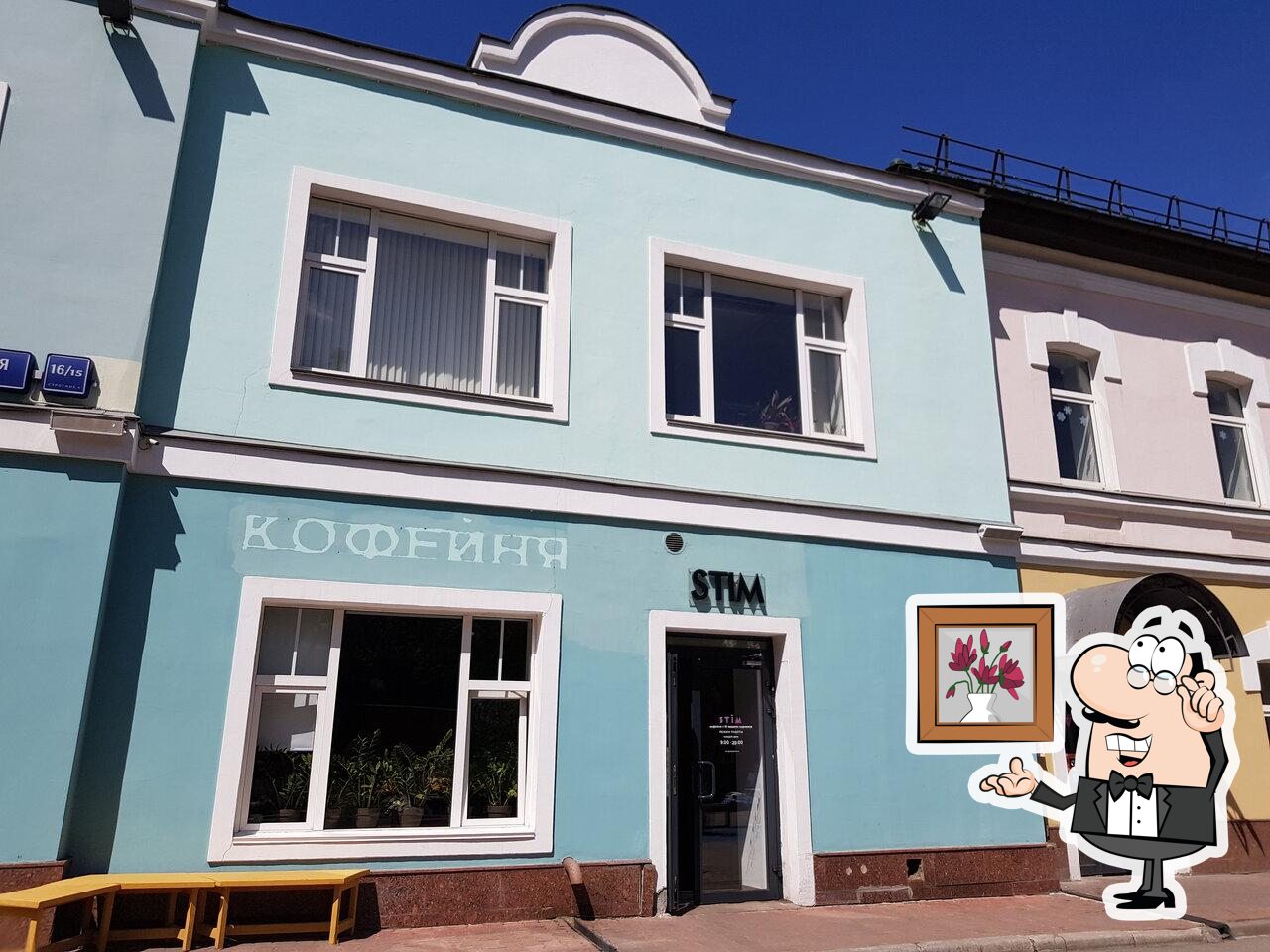 Посмотрите на внутренний интерьер "Stim Coffee".