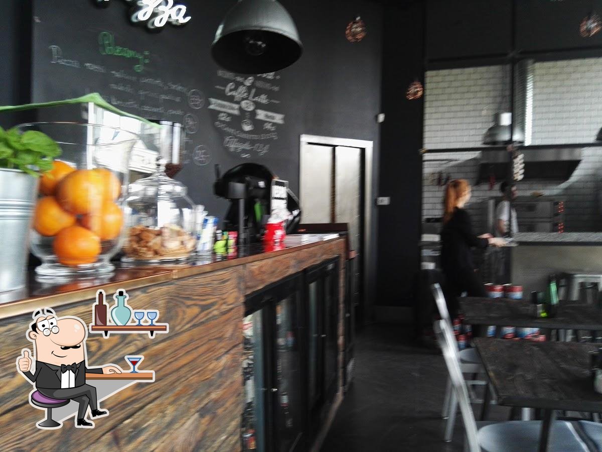 Посмотрите на внутренний интерьер "Pizzeria 360° Wilanów".