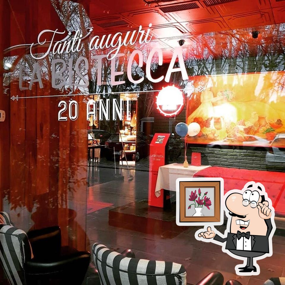 Посмотрите на внутренний интерьер "La Bistecca".