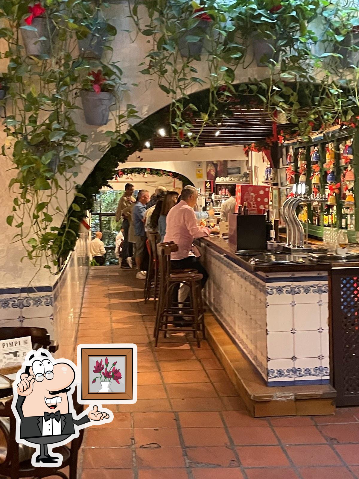 Забронируйте столик в "Bodega El Pimpi".