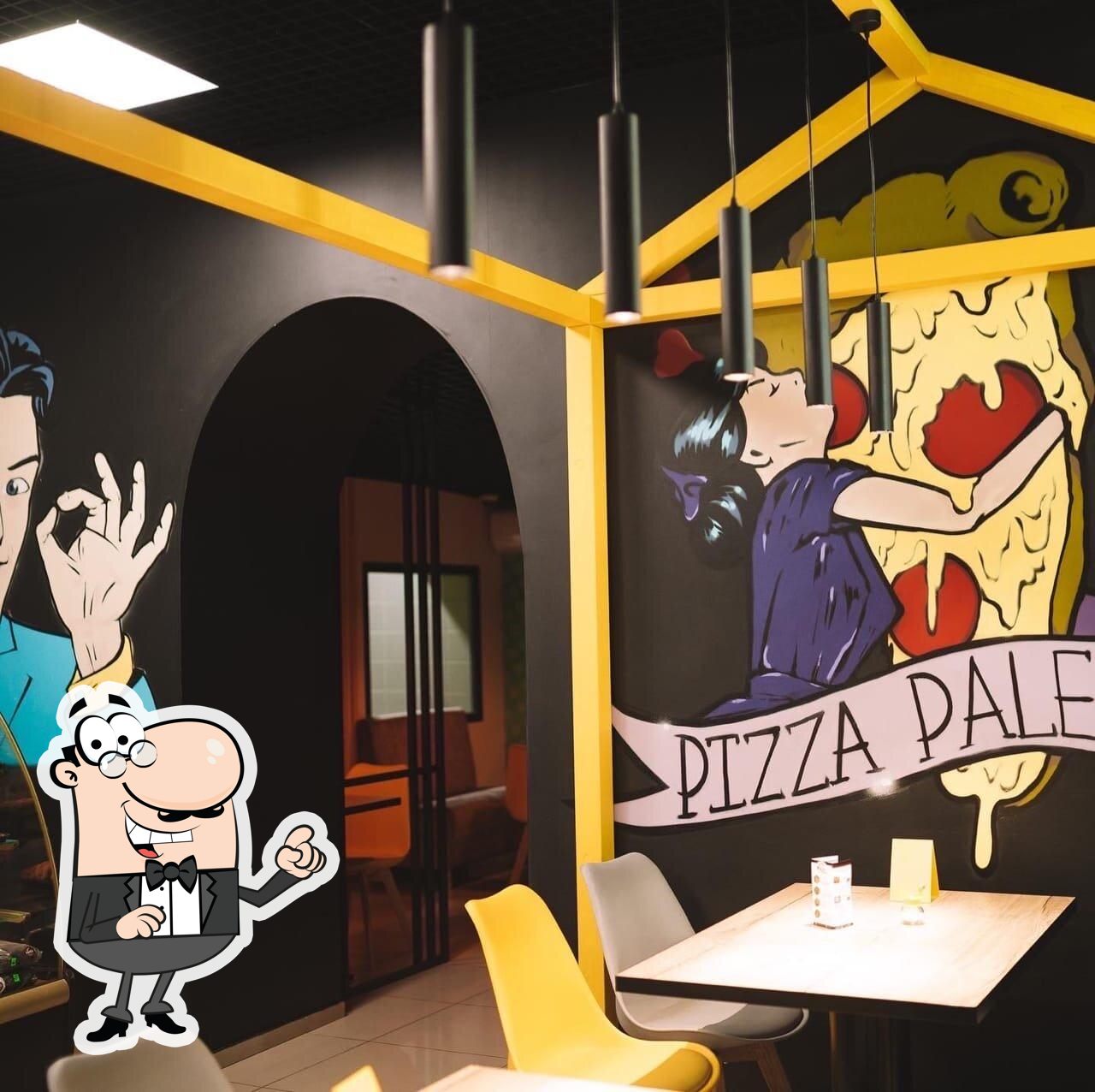 Посмотрите на внутренний интерьер "Pizza Palento".
