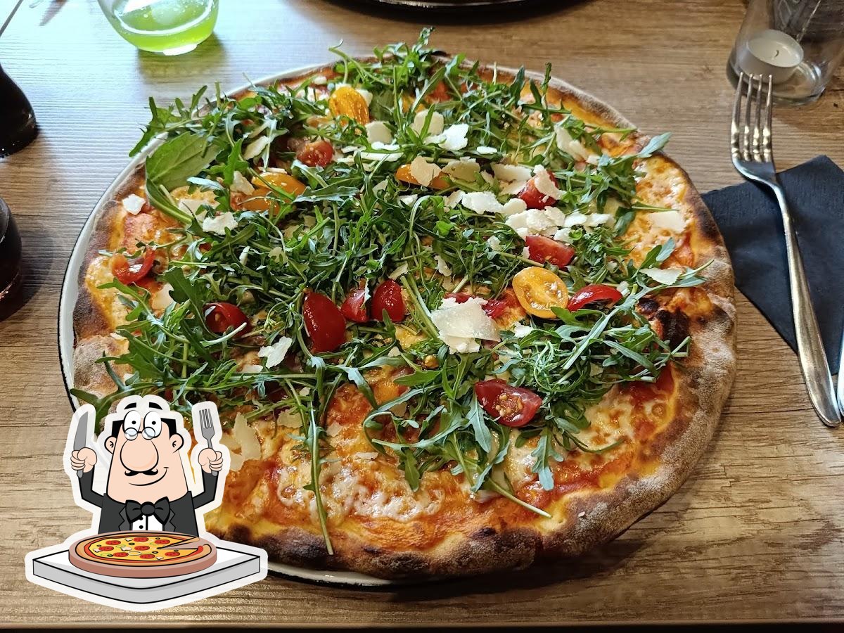 В "Restauracja Włoska Vivere Italiano – Pizza Bezglutenowa I Owoce Morza I Wino Wrocław" вы можете попробовать  пиццу.