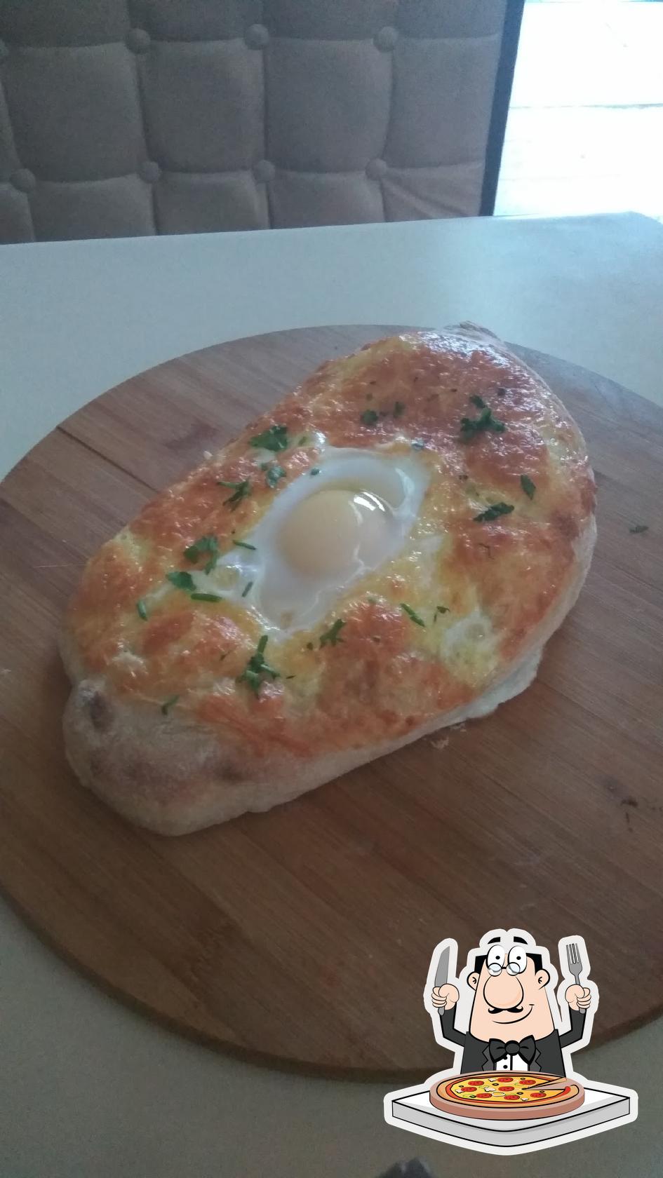 В "Мимино" вы можете попробовать  пиццу.