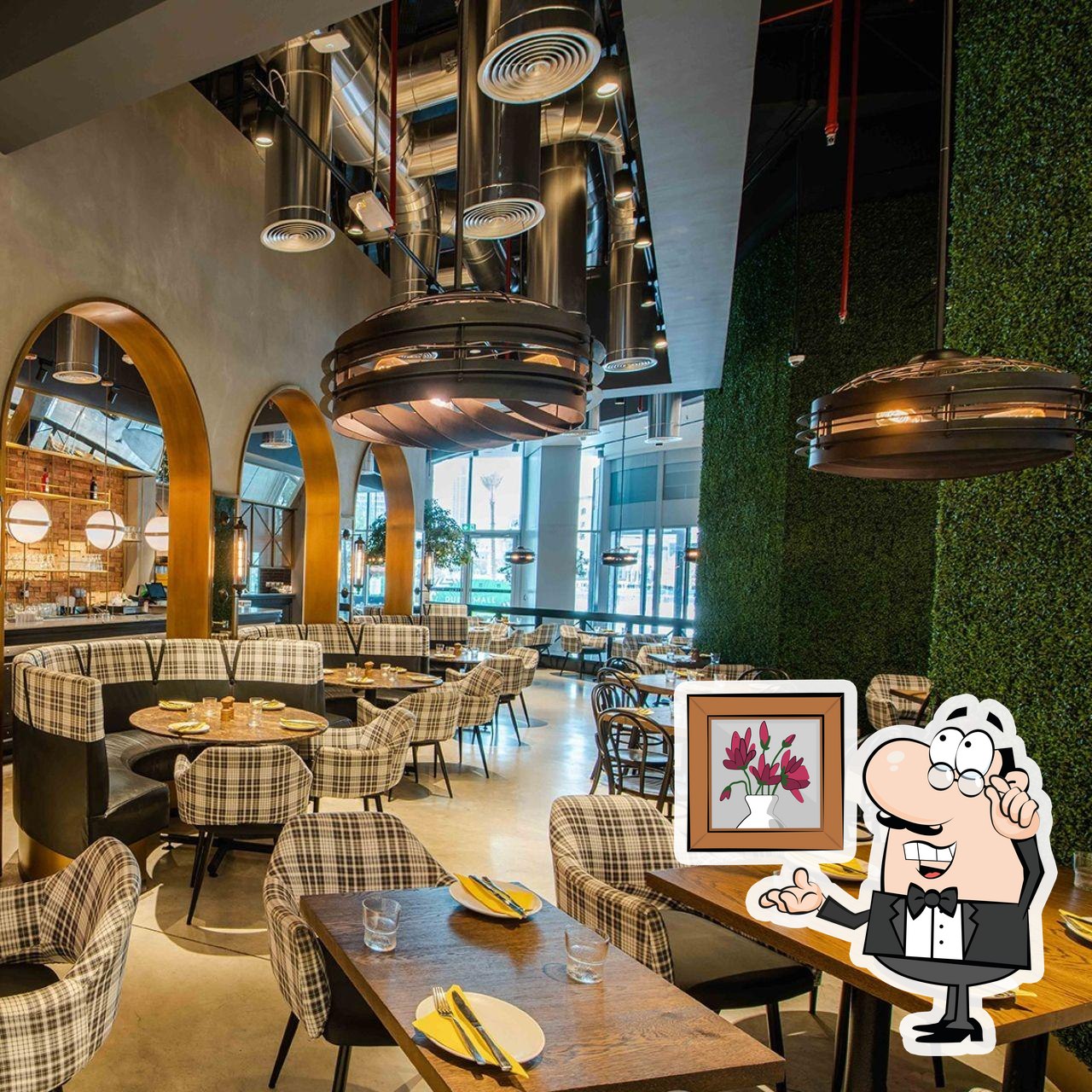 Забронируйте столик в "Hurricane’s Grill Dubai Mall".