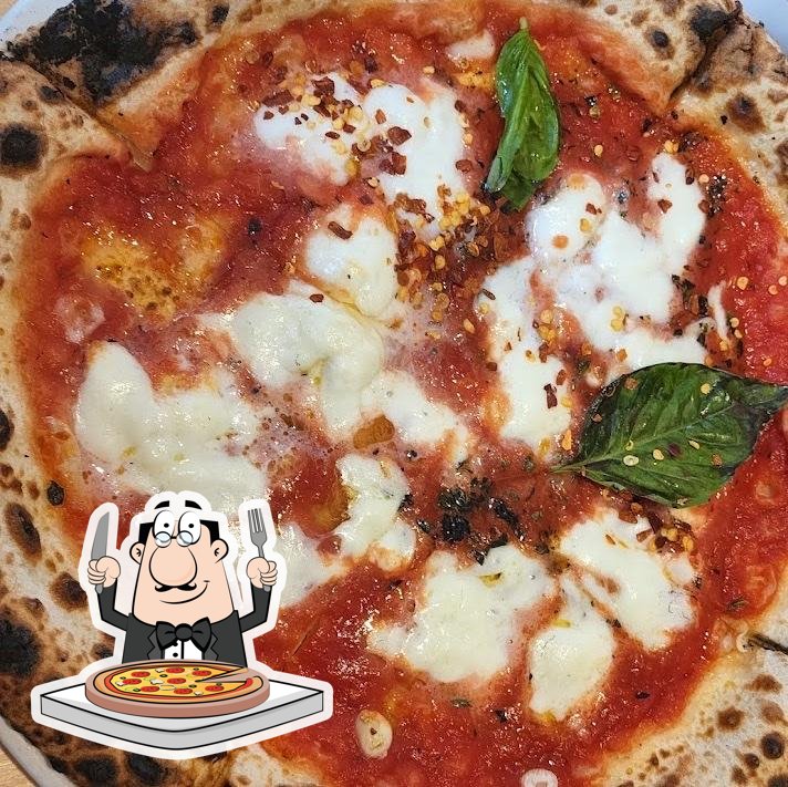 Попробуйте пиццу в "Nina Pizza Napolitaine St-Roch".