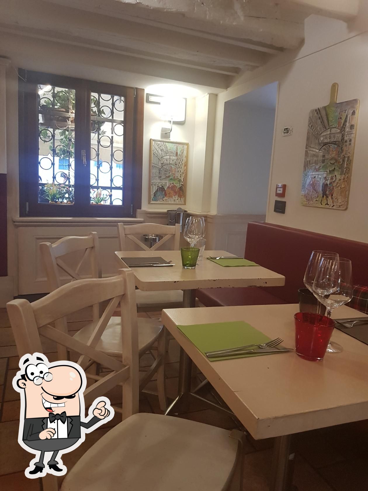 Забронируйте столик в "Osteria Al Pozzo Roverso".