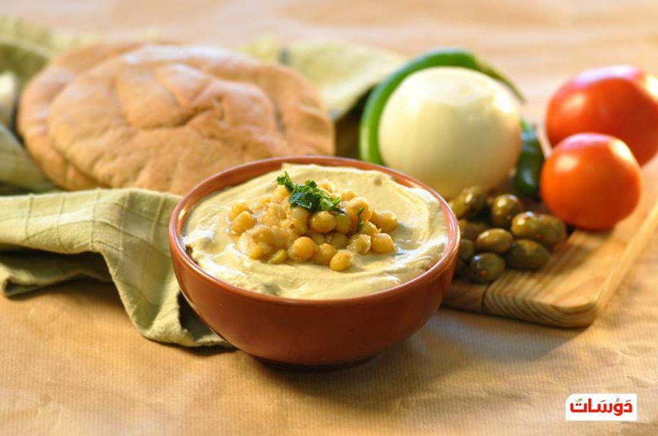 مطعم ثلاثة على الحطب