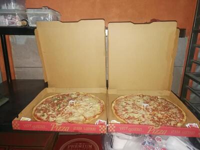 Pizzeria más Q' Tuannis