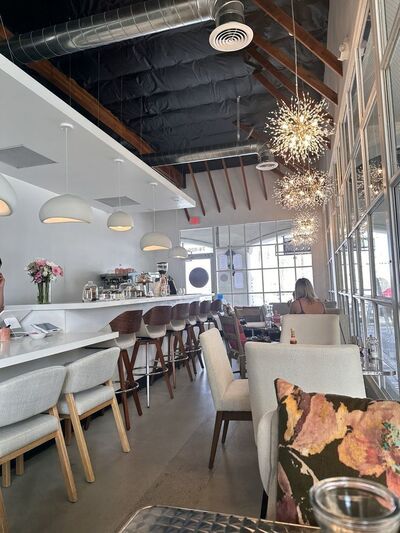 The Blushing Peony Wine Bar & Cafe