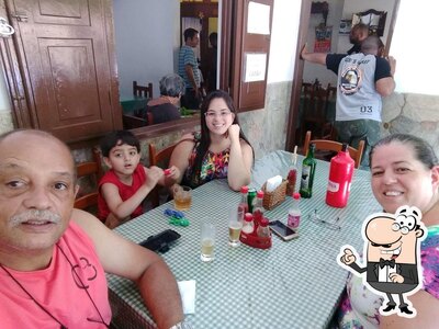 Sente em uma das mesas no O Italiano de lumiar cozinha brasileira e italiana