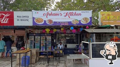 Take a seat at one of the tables at Arham's kitchen