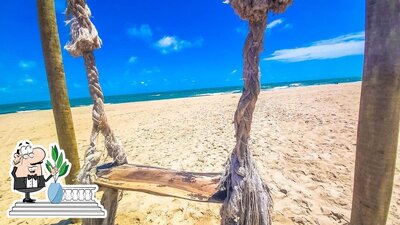 Desfrute da vista da área externa do Zebra Beach Restaurante