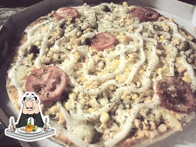 Comida em Pizzaria Alquimia