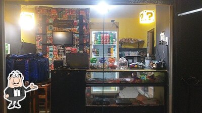 Sente em uma das mesas no Point GR's