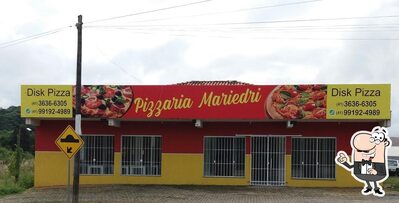 Você pode espairecer no na área externa do Pizzaria Mariedri