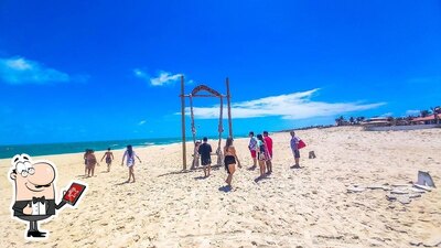 Desfrute da vista da área externa do Zebra Beach Restaurante