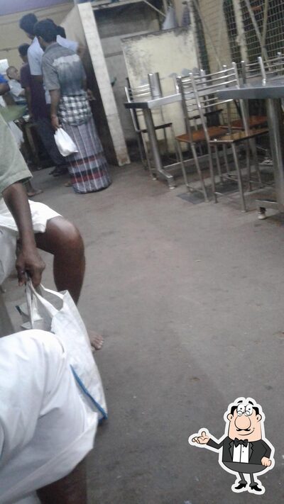 Take a seat at one of the tables at Velmurugan