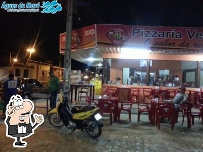 O interior do Pizzaria veneza baixa do meio