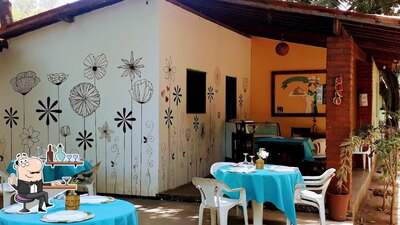 Sente em uma das mesas no Tempero da Dri