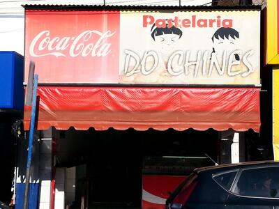 A publicidade apresenta informações sobre o Pastelaria do Chinês