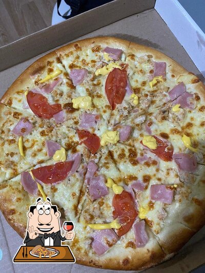 Essayez des pizzas à Пиццари