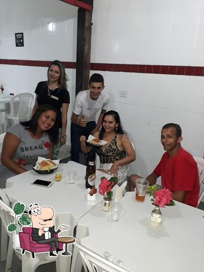 O interior do Thacafe Lanches
