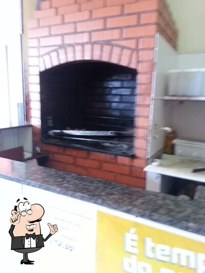 Sente em uma das mesas no Jericocó Carne De Sol