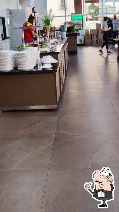 Veja imagens do interior do Titon Grill Restaurante