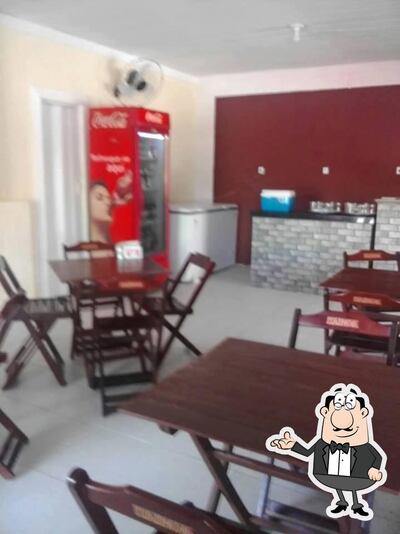 Sente em uma das mesas no Novo Sabor Pacajus CE