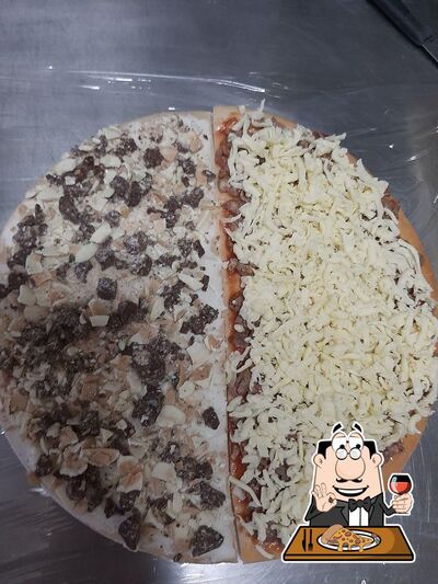 Experimente pizza no Restaurante e Churrascaria do Fritz