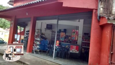 a área exterior é uma característica importante do Padaria e Mercearia Vila Suissa