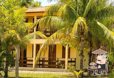 Veja imagens do exterior do Pousada Coco Dendê