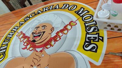 O logotipo do Churrascaria Do Moisés